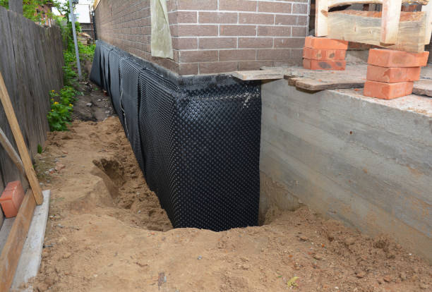 SJ Waterproofing Pros technician performing targeted Interior Drainage System assessment in Rockwood, TN